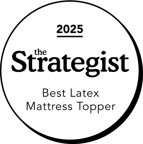 Badge from 'the Strategist' declaring the Birch Plush Organic Topper as 'Best Latex Mattress Topper' for the year 2025.