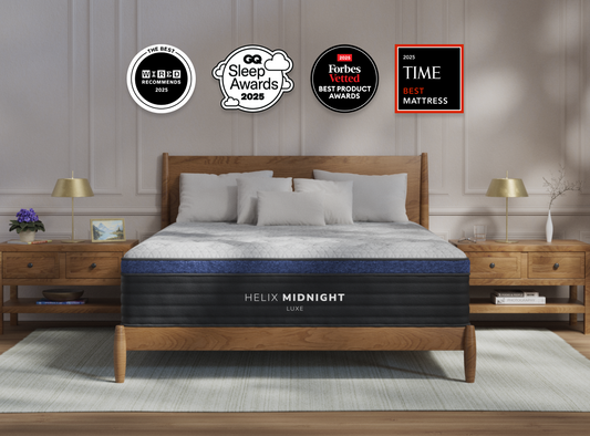 A rendered image of the Midnight Luxe mattress in a bedroom scene. 
