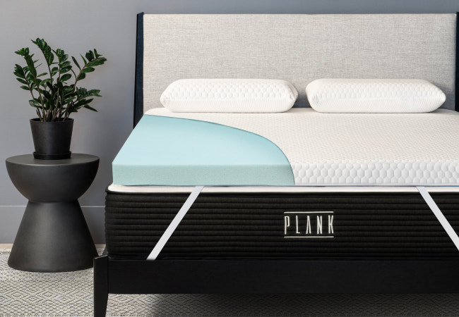 Plank Firm Topper with cutaway view showcasing its pressure-relieving foam layers for a firmer sleep surface. for The Mattress Shop, showcasing product image Brooklyn Bedding Plank Firm Topper on the page: Best Mattress Toppers page.