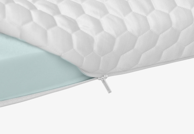 Plank Firm Topper megazoom showcasing its thick, supportive foam layers designed for firmer sleep comfort. for The Mattress Shop, showcasing product image Brooklyn Bedding Plank Firm Topper on the page: Best Mattress Toppers page.