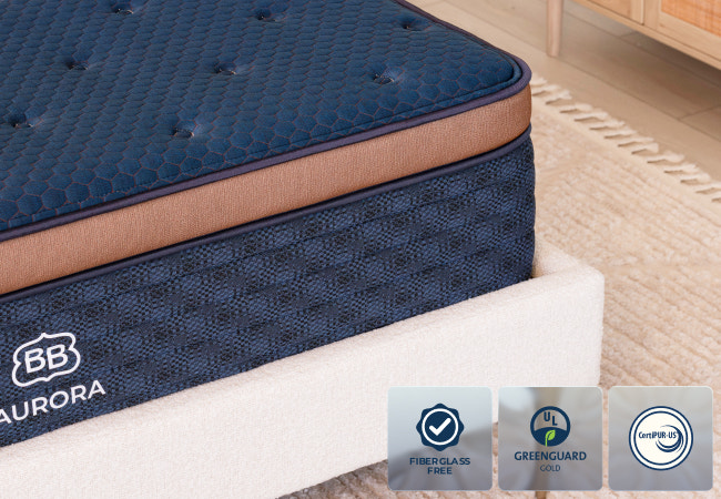 Brooklyn Bedding Aurora mattress corner close-up, fiberglass free, GREENGUARD Gold, and CertiPUR-US certified. for The Mattress Shop, showcasing product image Brooklyn Bedding Aurora Luxe Cooling on the page: Best Hybrid Mattresses page.