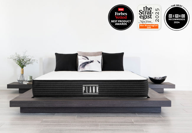 Brooklyn Bedding Plank mattress with award badges, Forbes Vetted best product, New York Strategist 100, and Wired recommends for The Mattress Shop, showcasing product thumbnail image for Brooklyn Bedding Plank Firm on the product page.
