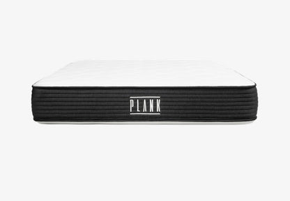 Brooklyn Bedding Plank firm mattress front product view with black ribbed sides and white sleep surface
