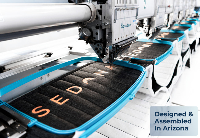 Brooklyn Bedding Sedona Elite mattress being assembled in arizona factory for The Mattress Shop, showcasing product image Brooklyn Bedding Sedona Elite on the page: Best Hybrid Mattresses page.
