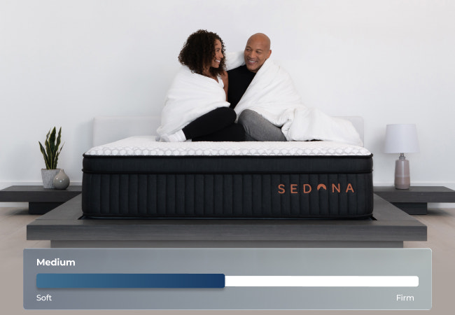 Brooklyn Bedding Sedona Elite lifestyle image with firmness scale showing medium for The Mattress Shop, showcasing product image Brooklyn Bedding Sedona Elite on the page: Best Hybrid Mattresses page.