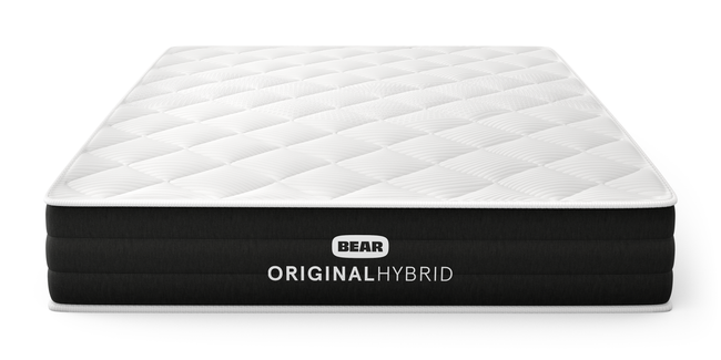 Bear Original Hybrid mattress three-quarter front view with white quilted top and black ribbed foundation for The Mattress Shop, showcasing product thumbnail image for Bear Original Hybrid on the product page.