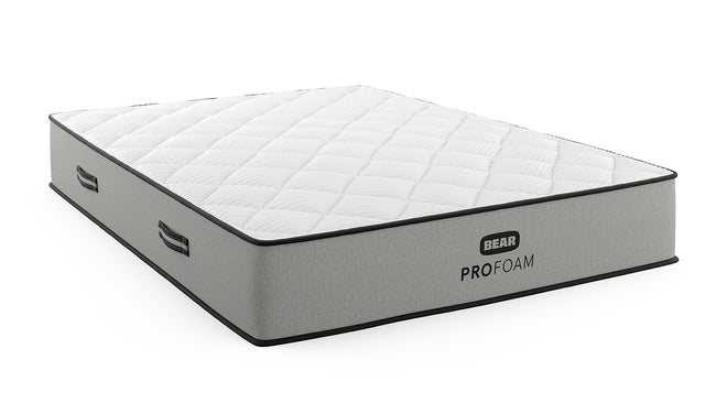 Bear Pro Foam mattress angled view with white quilted top, gray foundation, and side carry handles for The Mattress Shop, showcasing product thumbnail image for Bear Pro Foam on the product page.