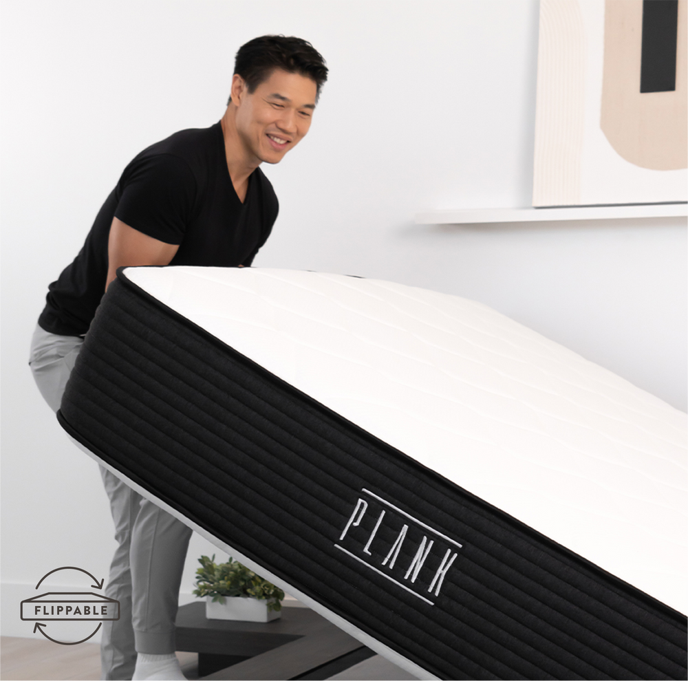 Plank flippable mattress with dual-sided firmness, high-density foam layers, and durable support core.