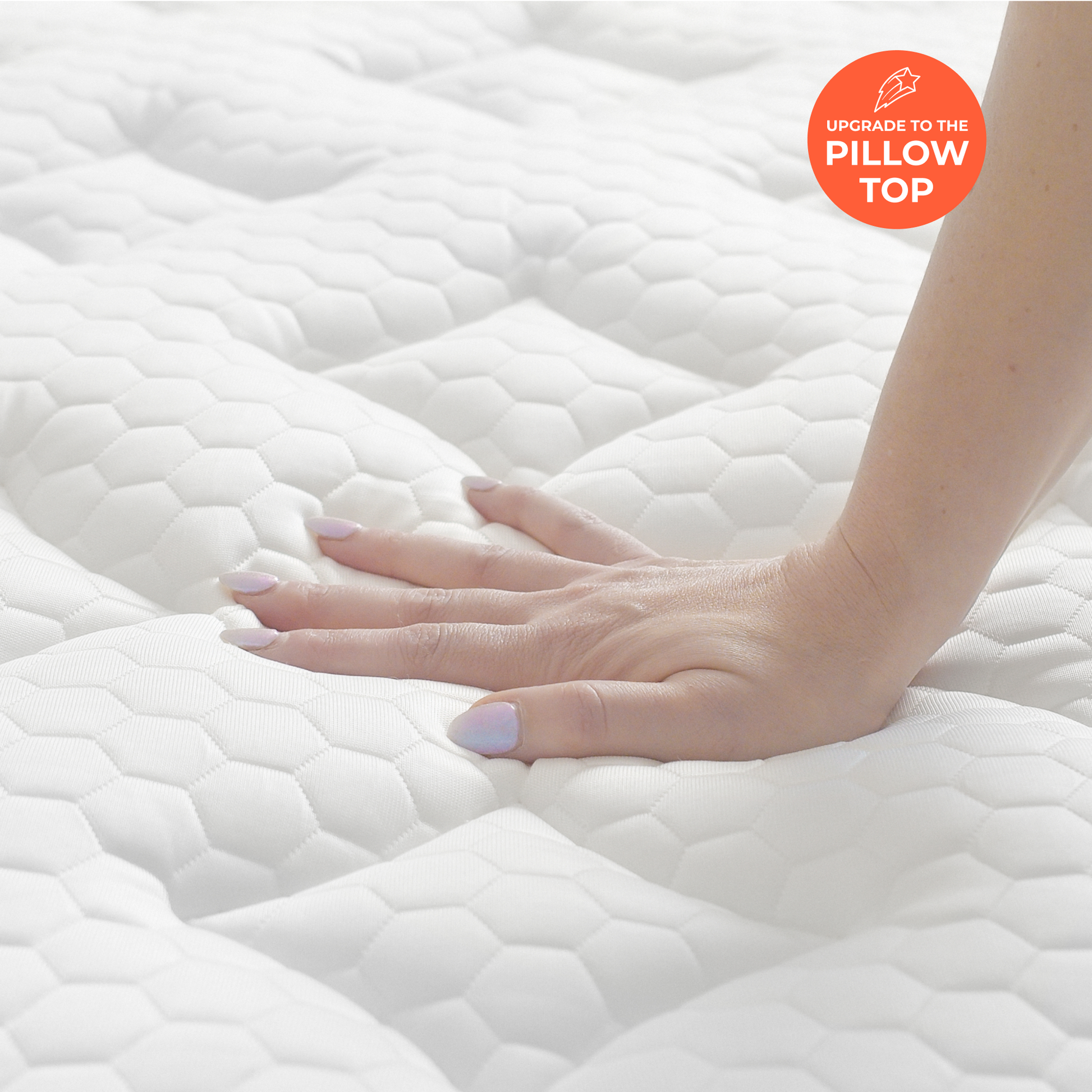 Hand pressing on signature cloud pillow top with 'Upgrade to the Pillow Top' text in the corner.
