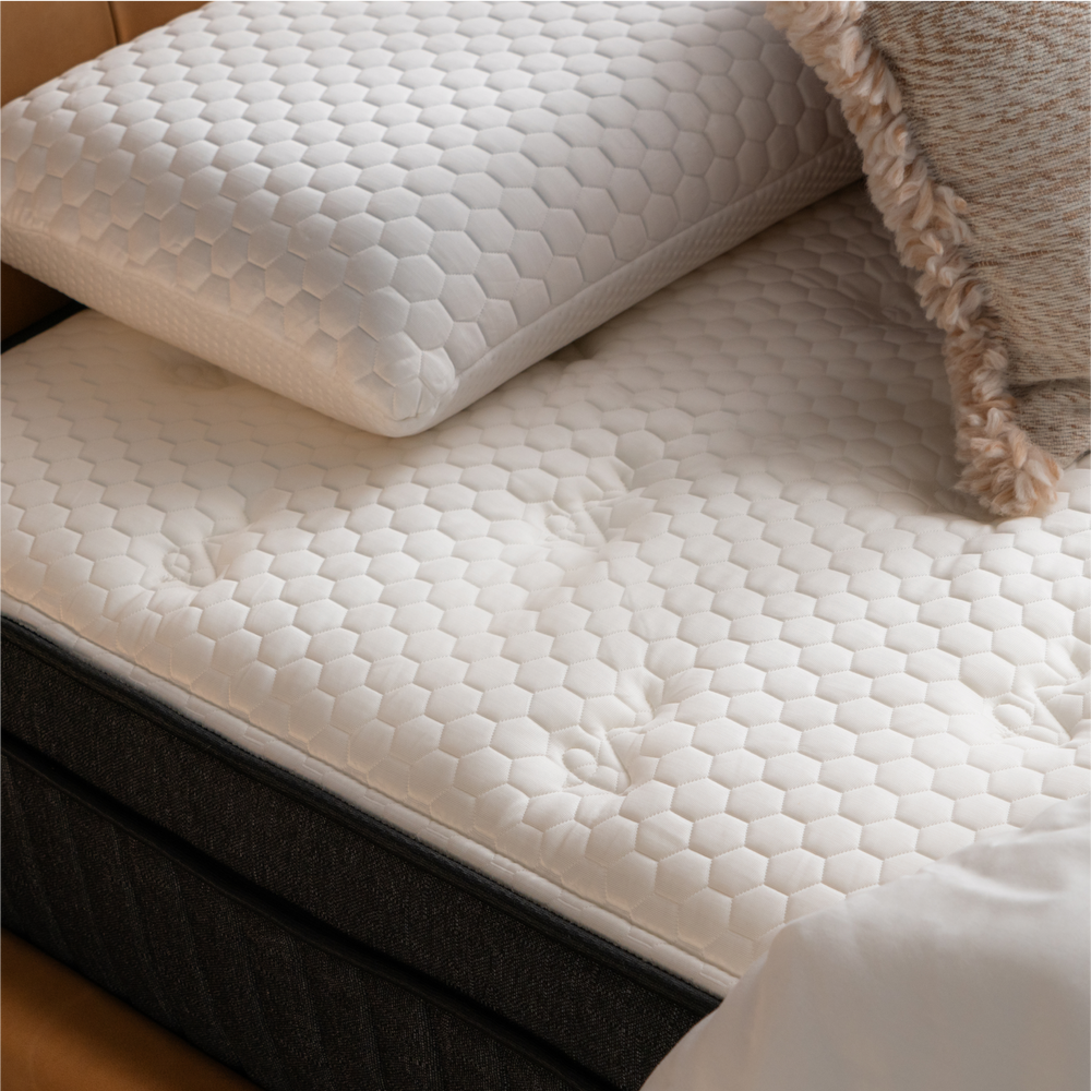 Cooling comfort mattress surface with quilted pressure-relief top designed for supportive sleep.