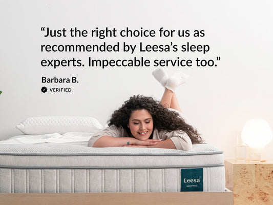 Woman relaxing on Leesa Oasis Chill mattress, verified review praising Leesa's sleep experts and service. for The Mattress Shop, showcasing product image for Leesa Oasis Chill Hybrid Mattress on the collection page.