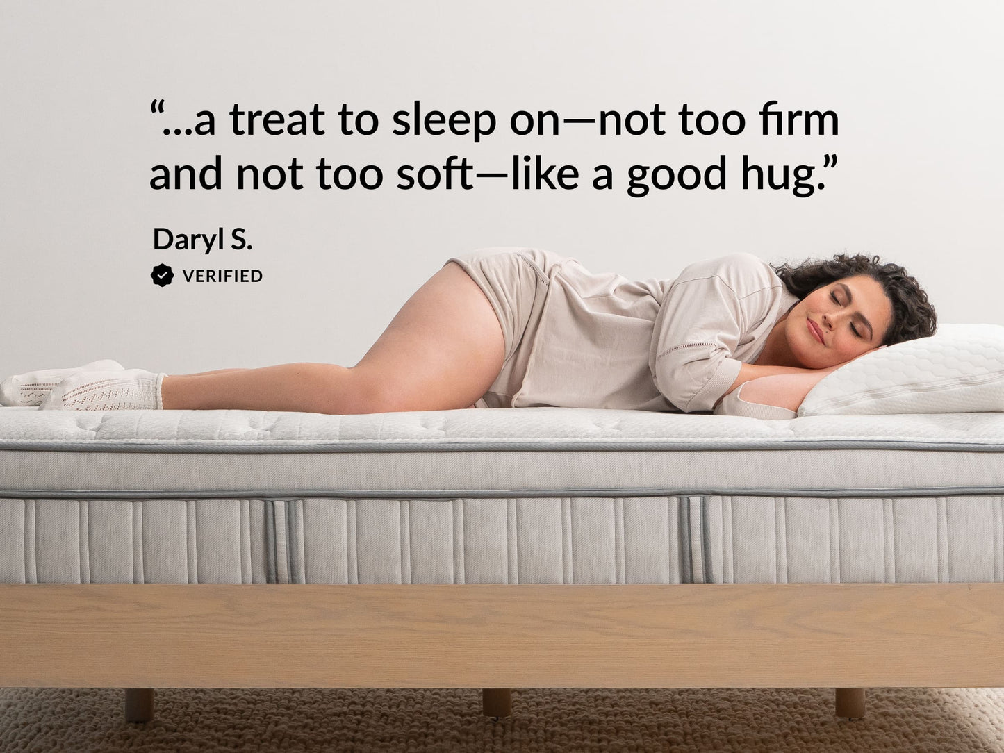 Woman sleeping on Leesa Oasis Chill mattress, verified review describing it as a treat, like a good hug. for The Mattress Shop, showcasing product image for Leesa Oasis Chill Hybrid Mattress on the product page.