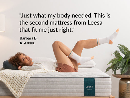 Woman relaxing on Leesa Studio Chill mattress, verified review calling it the second Leesa mattress that fit just right. for The Mattress Shop, showcasing product image for Leesa Studio Chill Hybrid Mattress on the collection page.