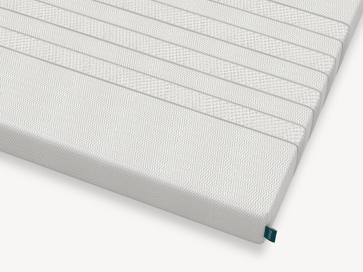 Corner detail of Leesa Kids mattress showing chevron-textured cover and brand label. for The Mattress Shop, showcasing product image for Leesa Kids Mattress on the product page.