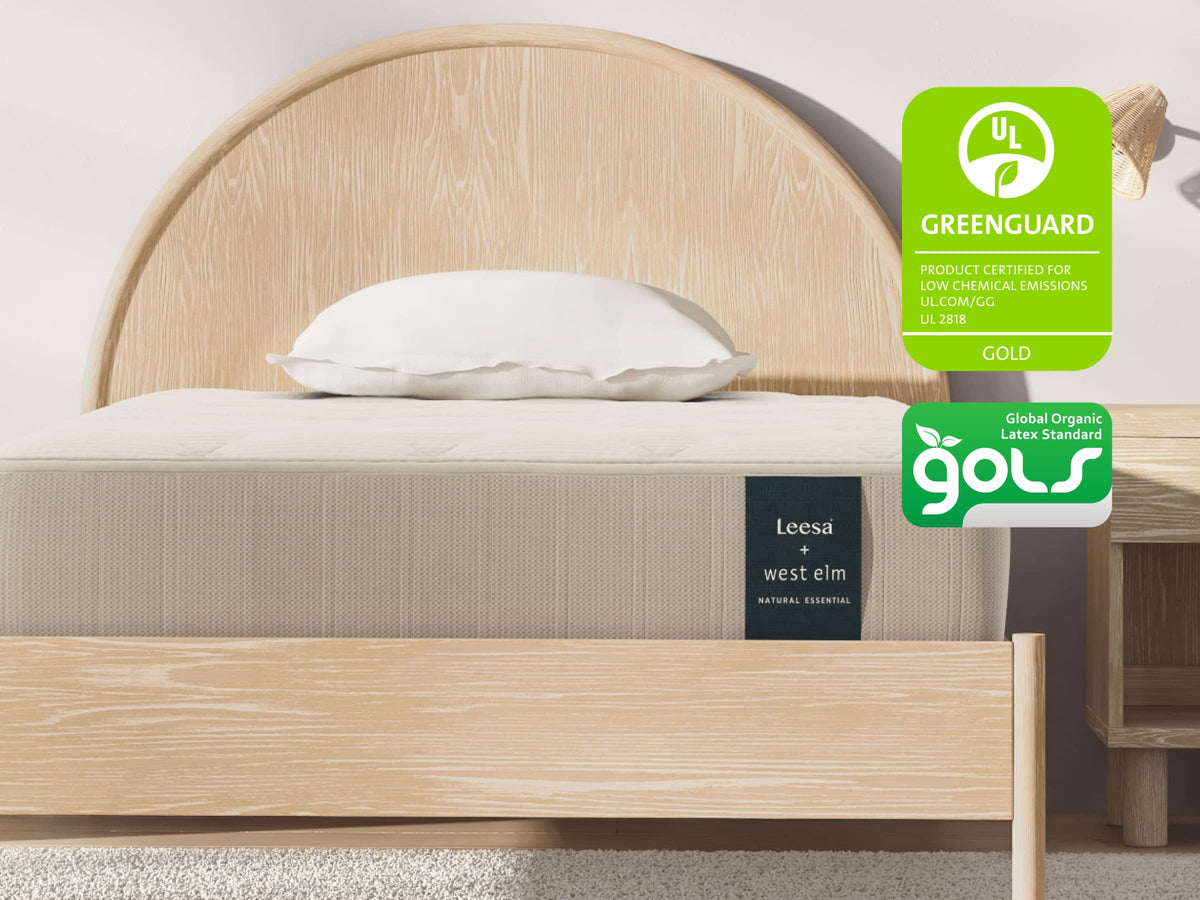 Leesa + West Elm Natural Essential mattress on an arched oak bed frame, certified GREENGUARD Gold and GOLS for The Mattress Shop, showcasing product image for Leesa Natural Essential Hybrid Mattress on the product page.