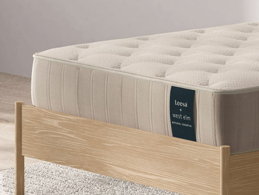 Close-up corner of Leesa Natural Essential mattress showing quilted cotton cover and tufted stitching detail. for The Mattress Shop, showcasing product image for Leesa Natural Essential Hybrid Mattress on the collection page.