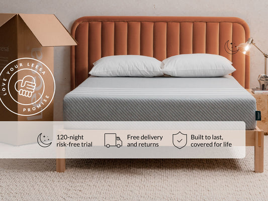 Leesa Original mattress on bed with white pillows, shipping box shows Love Your Leesa Promise and trial guarantee. for The Mattress Shop, showcasing product image for Leesa Original Mattress on the collection page.