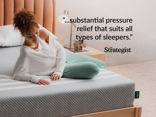 Woman relaxing on Leesa Original mattress, Strategist quote on pressure relief for all sleeper types. for The Mattress Shop, showcasing product image for Leesa Original Mattress on the collection page.