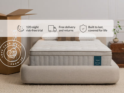 Leesa Legend Hybrid mattress on rattan bed frame with pillows, shipping box shows Love Your Leesa Promise.