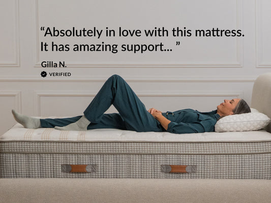 Woman lying on Leesa Legend Hybrid mattress, CNET quote calling it seriously comfortable and supportive. for The Mattress Shop, showcasing product image for Leesa Reserve Hybrid Mattress on the collection page.