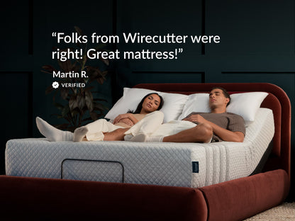 Couple sleeping on Leesa Sapira Hybrid mattress, verified review praising it as recommended by Wirecutter.