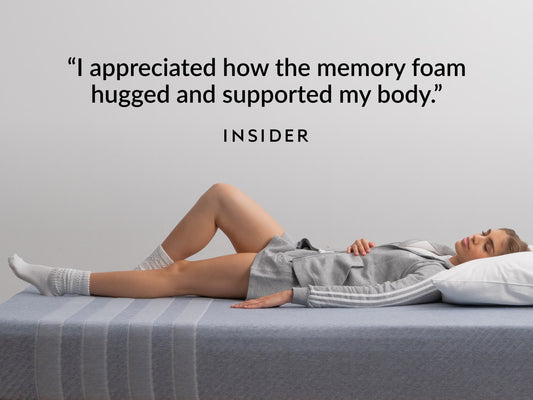 Woman lying on Leesa Studio mattress, Insider quote on memory foam that hugged and supported her body. for The Mattress Shop, showcasing product image for Leesa Studio Mattress on the collection page.