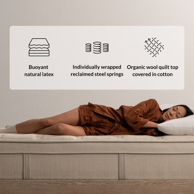 Woman on the Leesa Natural Hybrid Mattress in a bedroom.
