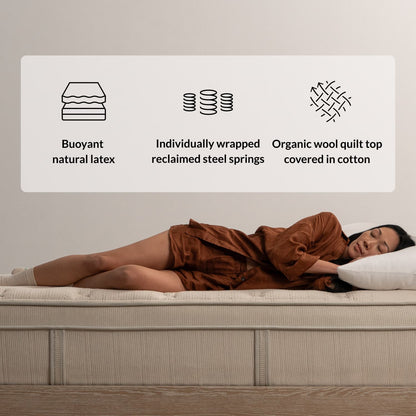 Woman on the Leesa Natural Hybrid Mattress in a bedroom.