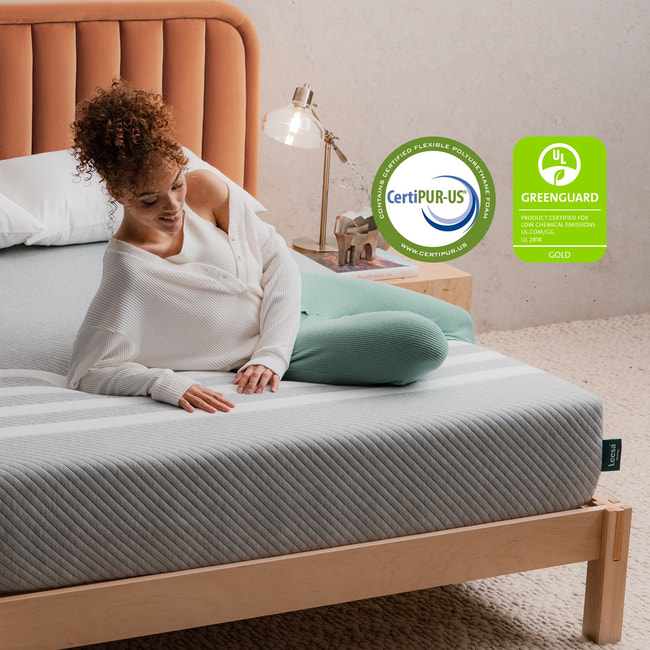 Woman on the Leesa Original Mattress in a bedroom. for The Mattress Shop, showcasing product image Leesa Original Mattress on the page: Best Memory Foam Mattresses page.