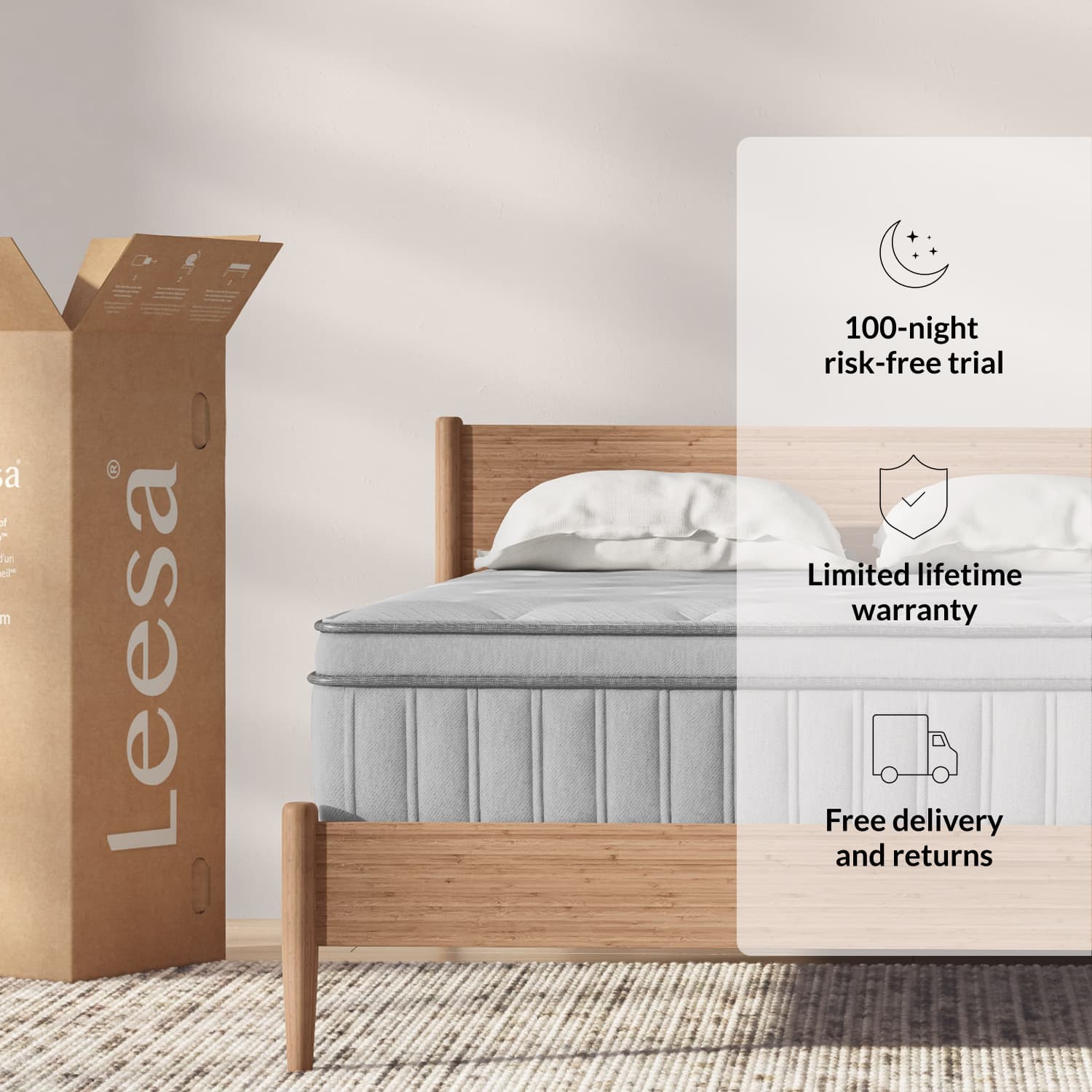 The Leesa Plus Hybrid Mattress in a bedroom.