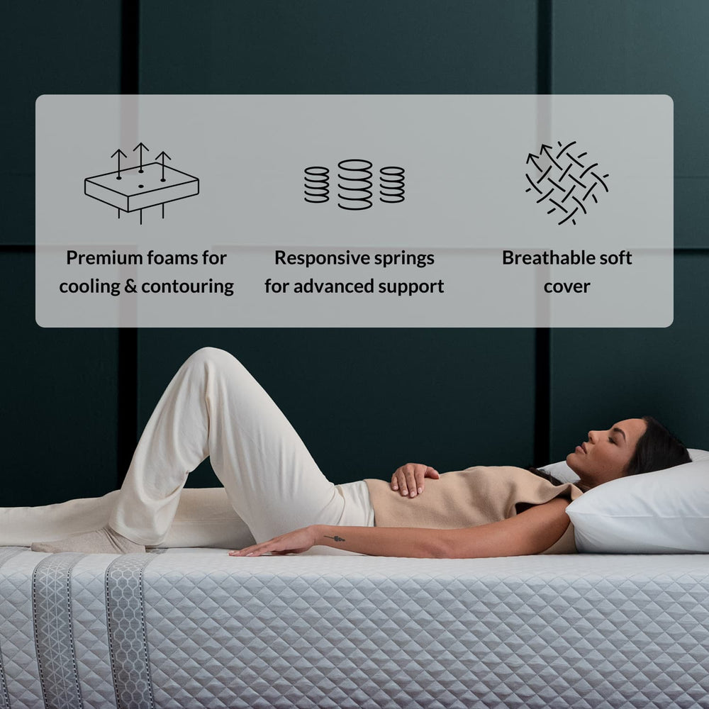 Woman on the Leesa Sapira Hybrid Mattress in a bedroom.