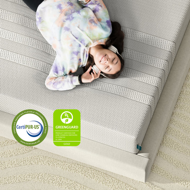 A child on the Leesa Youth Mattress in a bedroom. for The Mattress Shop, showcasing product image Leesa Youth Mattress on the page: Best Mattresses for Kids page.