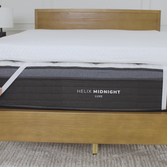 A looping video showing the Premium Mattress Topper on top of a Helix mattress