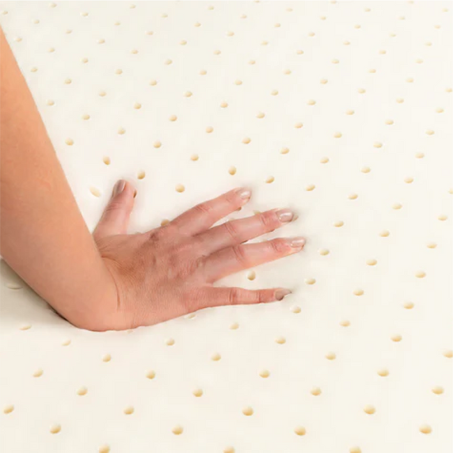 Talalay latex topper hand view showing its soft, supportive design for added comfort and pressure relief on your mattress.